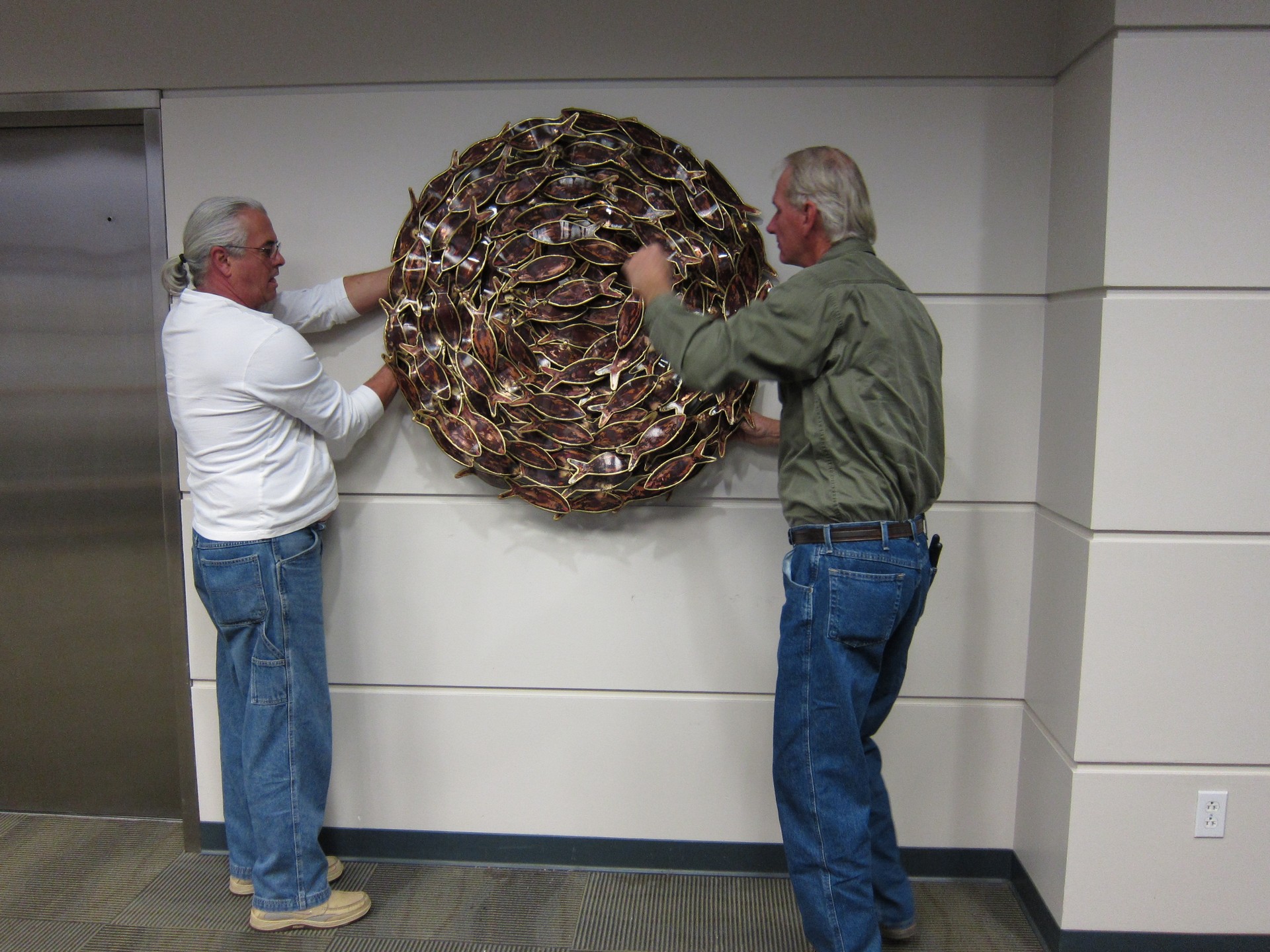 Photo: Bait Ball by Larry Schwartz being installed at the ‘NOAA South East Regional Offices, St. Petersburg, FL